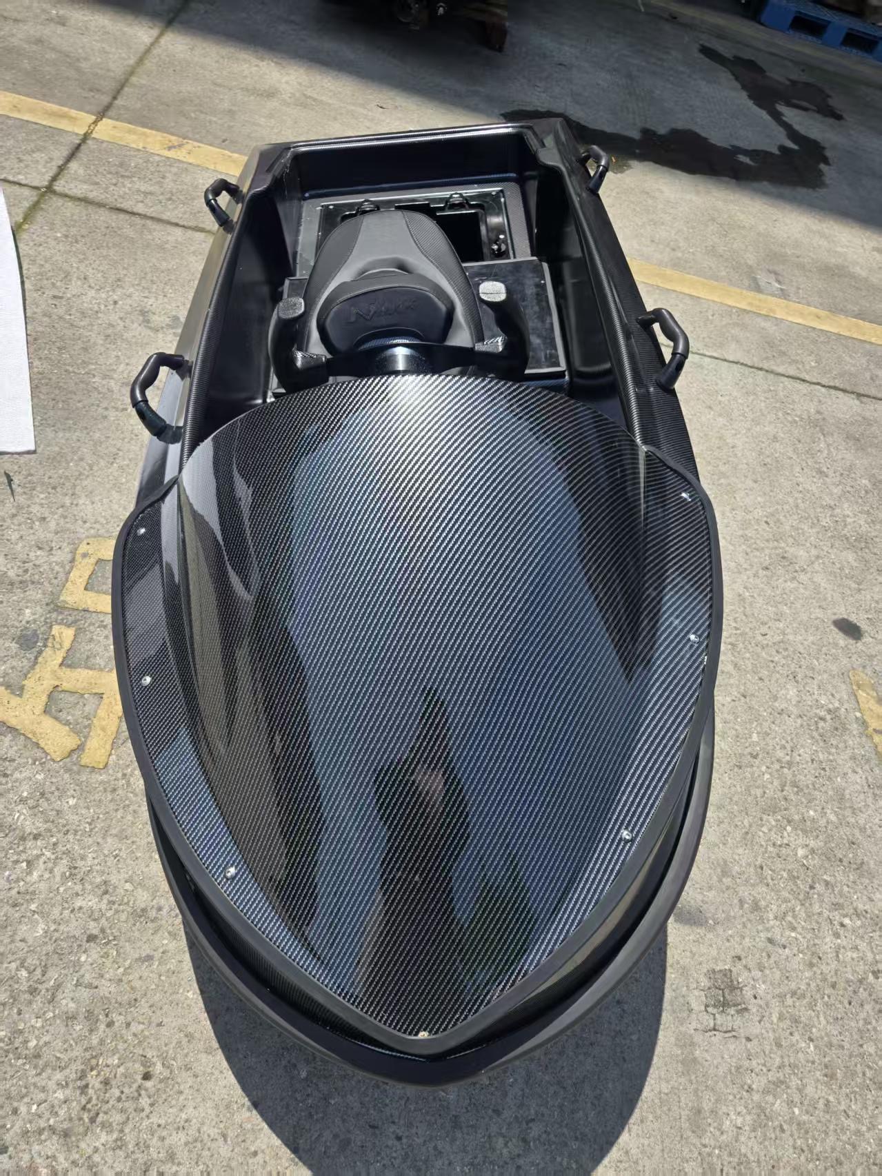 Top-down view of the upgraded carbon-finish LakeVolt hull and single seat